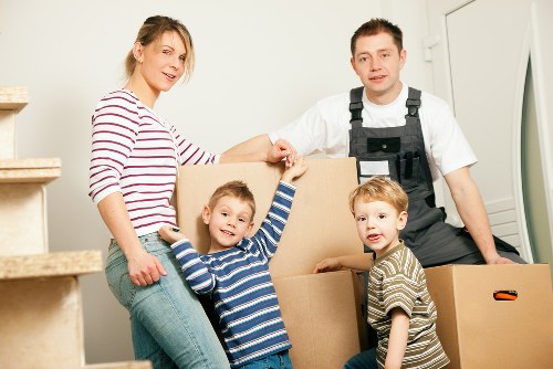 Local man with van moving boxes in Tooting