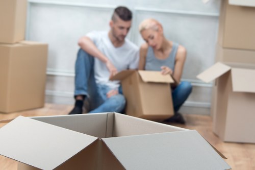 Packing office equipment and furniture for relocation in Tooting