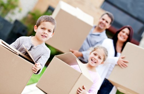 Careful packing and wrapping of household items for a local removal service