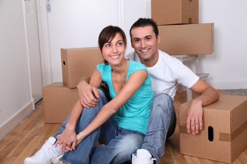 Packed boxes and furniture ready for a flat move in Tooting