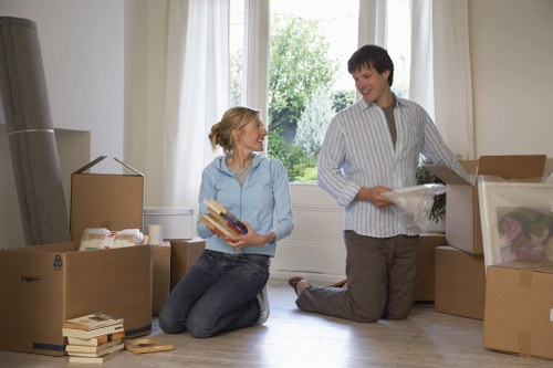 Unpacking boxes in a new Tooting property after a move