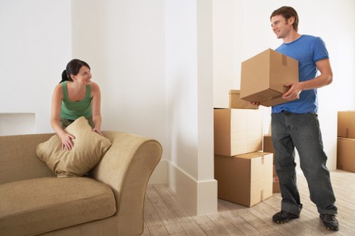 Packed boxes and furniture prepared for transport in SW17